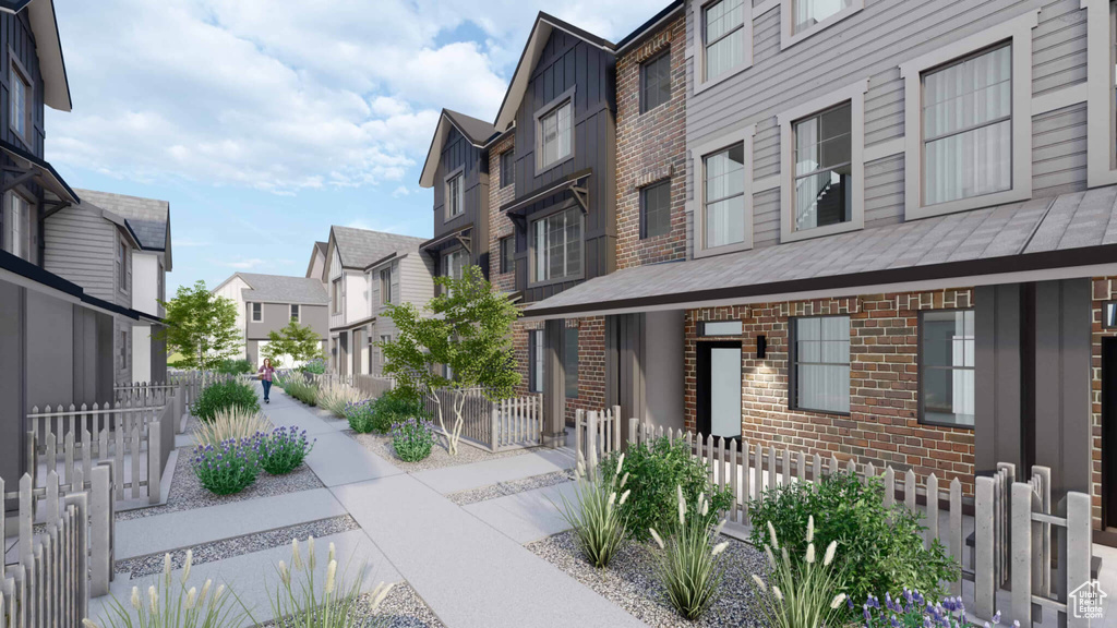 Surrounding community featuring a residential view and fence