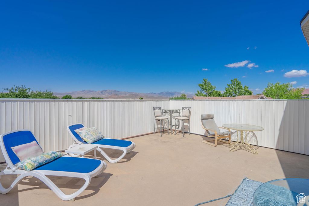View of patio / terrace featuring a mountain view