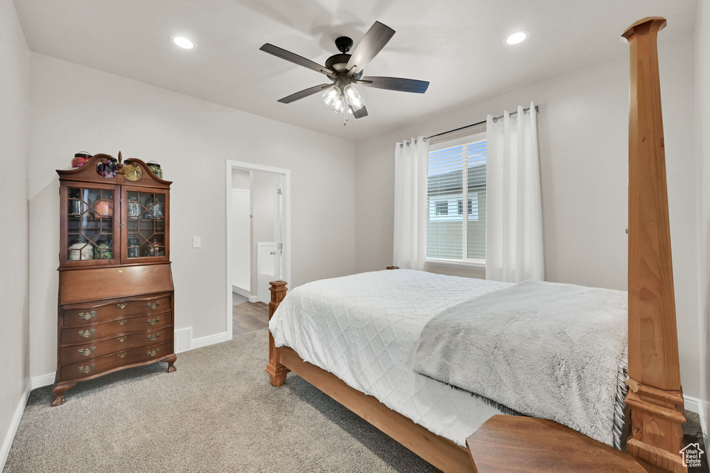 Bedroom featuring baseboards, recessed lighting, carpet, and a ceiling fan