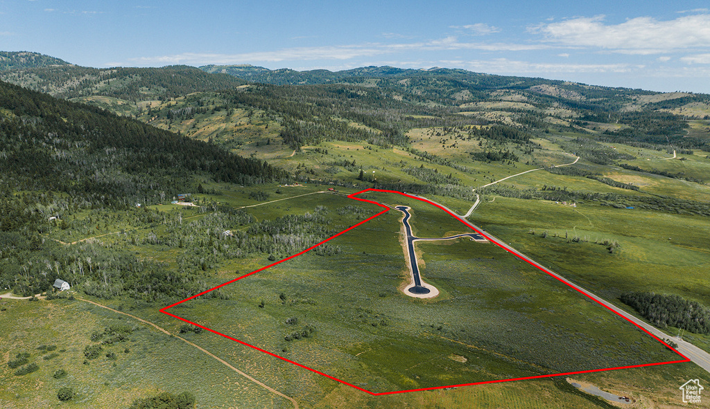 View of rural area featuring a mountain backdrop