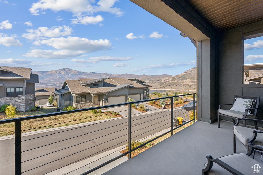 Balcony with a mountain view and a residential view