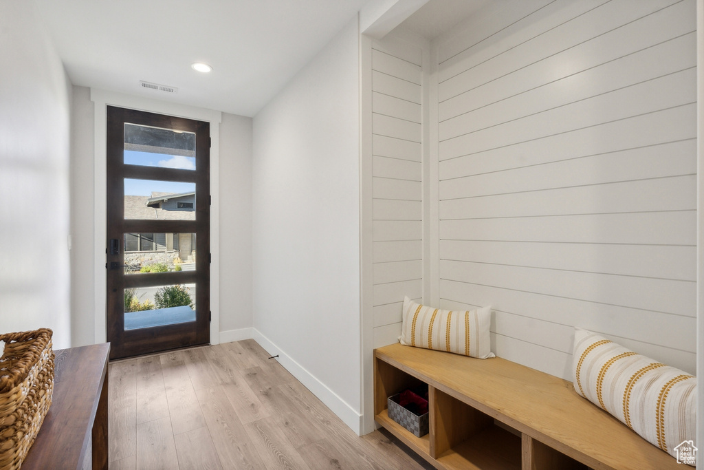 Mudroom with baseboards, light wood finished floors, and recessed lighting