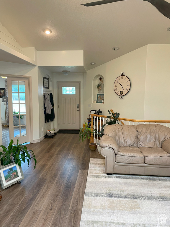 Living room featuring wood finished floors, ceiling fan, recessed lighting, and baseboards