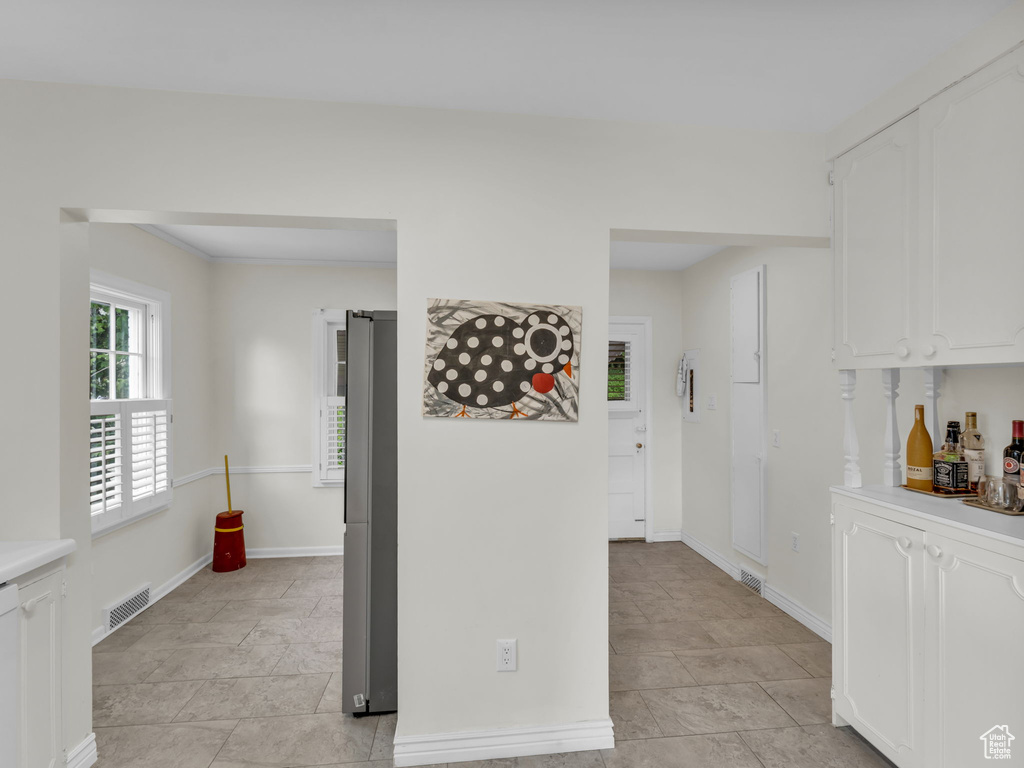 Hallway featuring baseboards