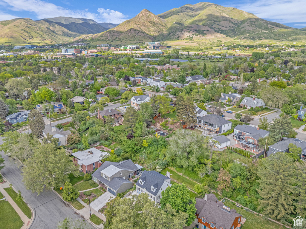 View of property location featuring a mountainous background and nearby suburban area