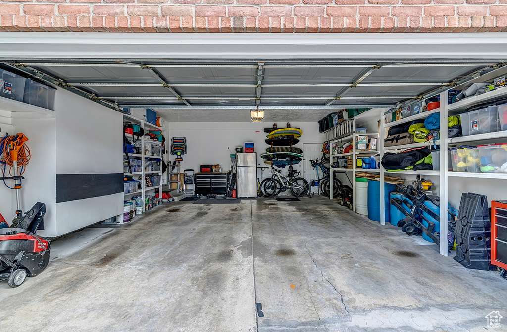 Garage with freestanding refrigerator