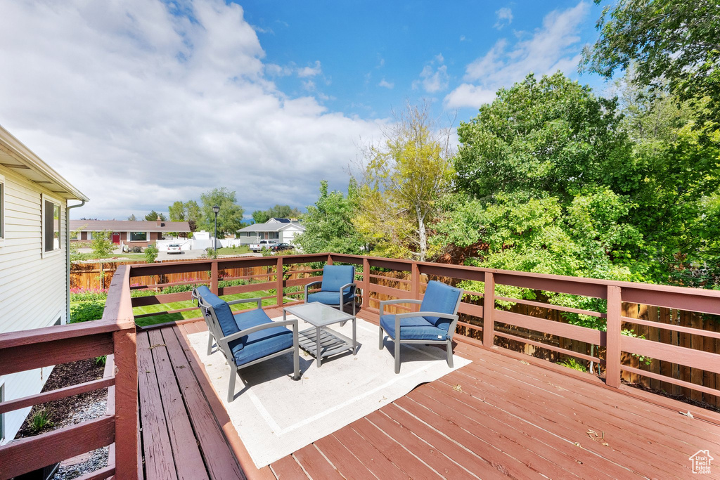 Wooden terrace with outdoor lounge area