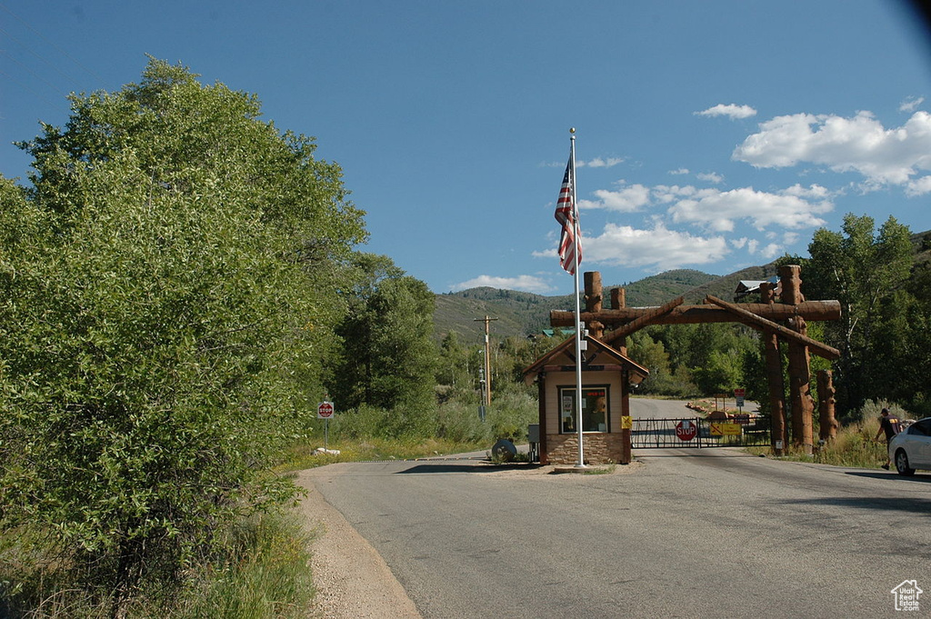 View of asphalt street with a mountain view