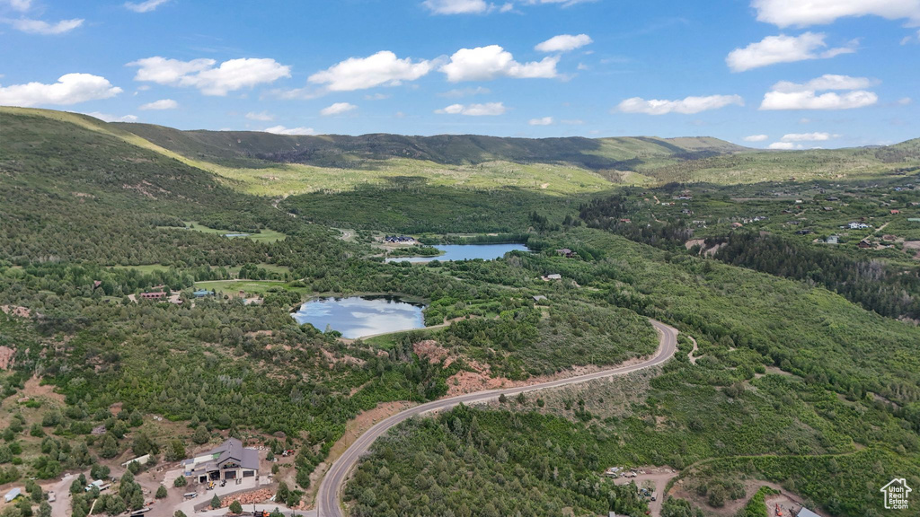 View of mountain background featuring a large body of water