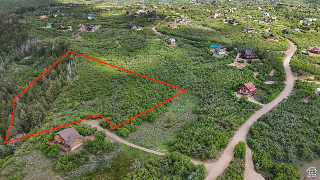 Aerial overview of property's location featuring property boundaries highlighted