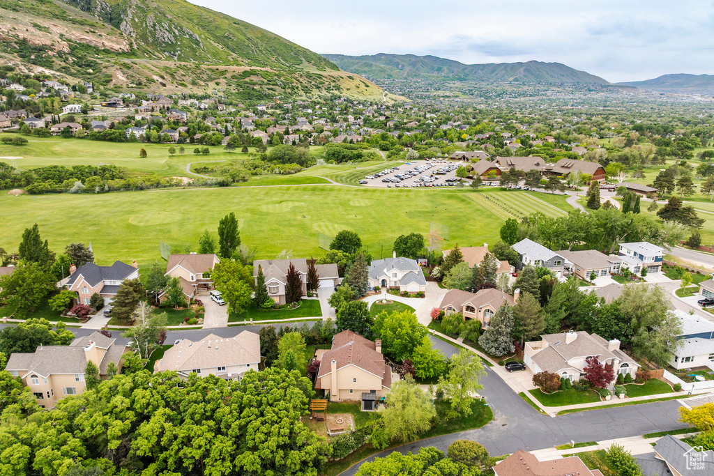 Aerial view of residential area featuring mountains