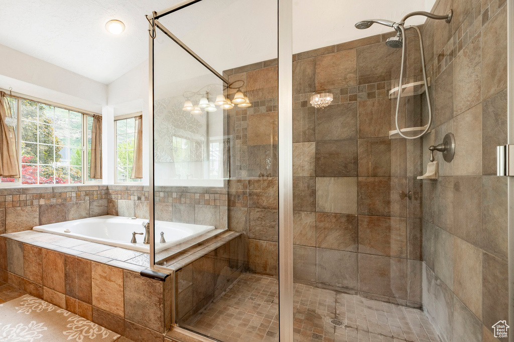 Full bathroom with a shower stall