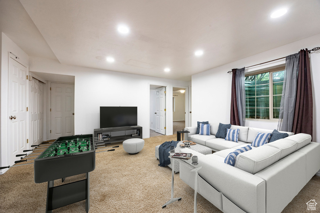 Living room featuring recessed lighting and carpet floors