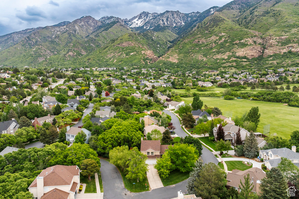 Aerial view of residential area with mountains