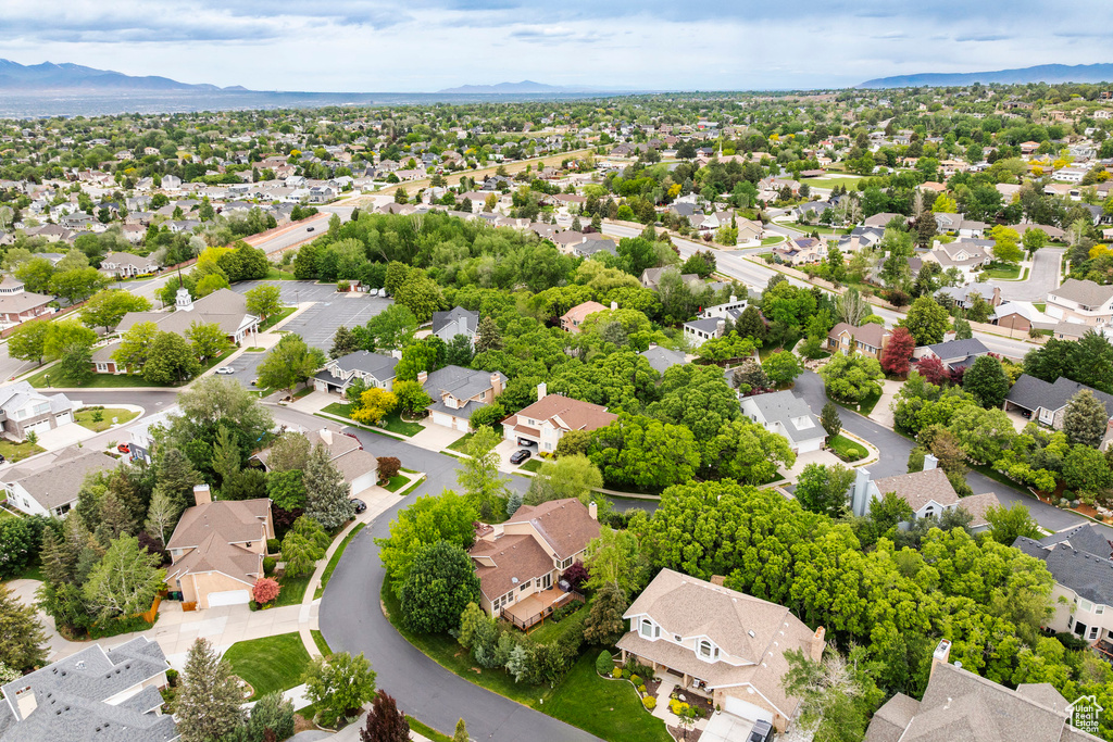 Aerial view of residential area with a mountain backdrop