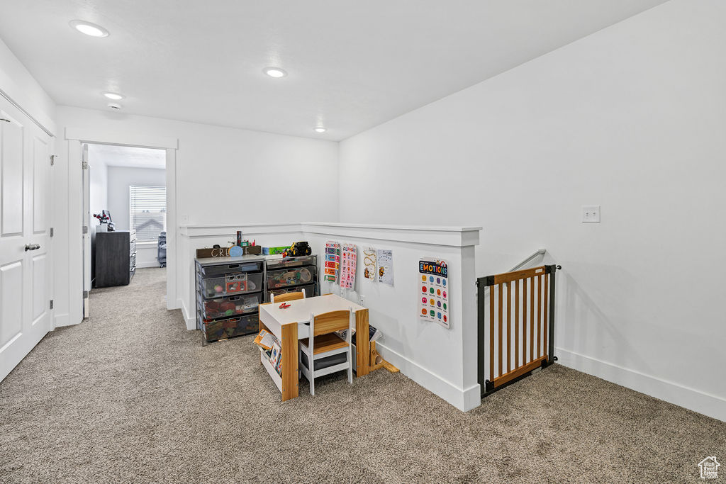 Bedroom with carpet floors, recessed lighting, and baseboards