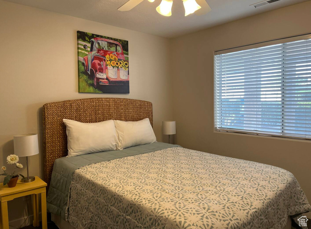 Bedroom featuring ceiling fan