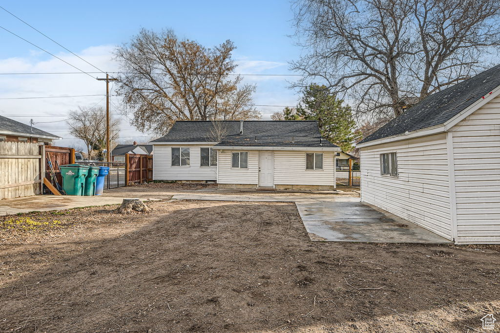 Back of property featuring a patio area