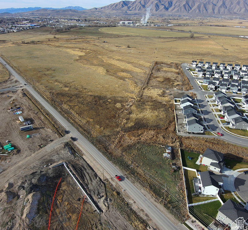 Aerial view of residential area with a mountain backdrop