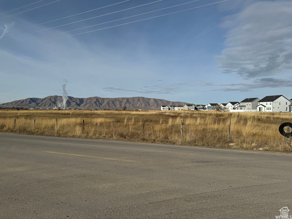 View of asphalt road featuring a mountain view