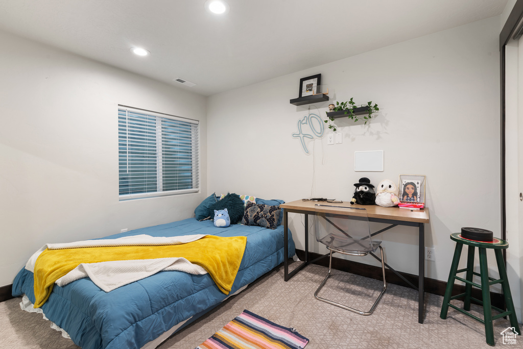 Bedroom featuring recessed lighting and baseboards