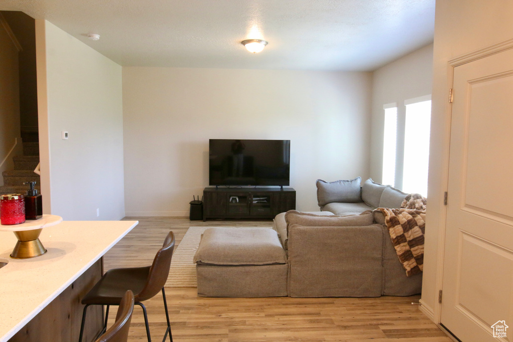 Living area featuring light wood-type flooring