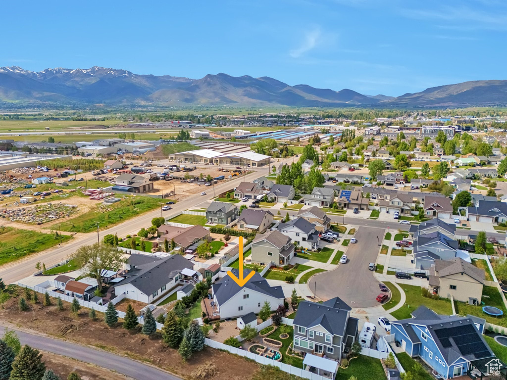 Aerial view of residential area with mountains