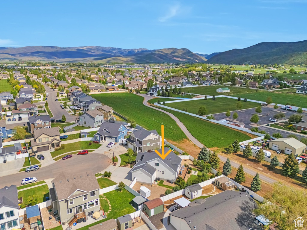 Aerial view of residential area with mountains