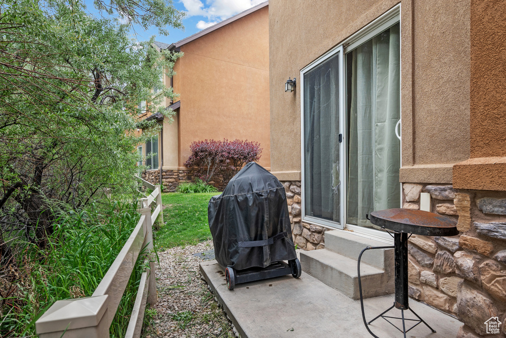 View of patio with area for grilling