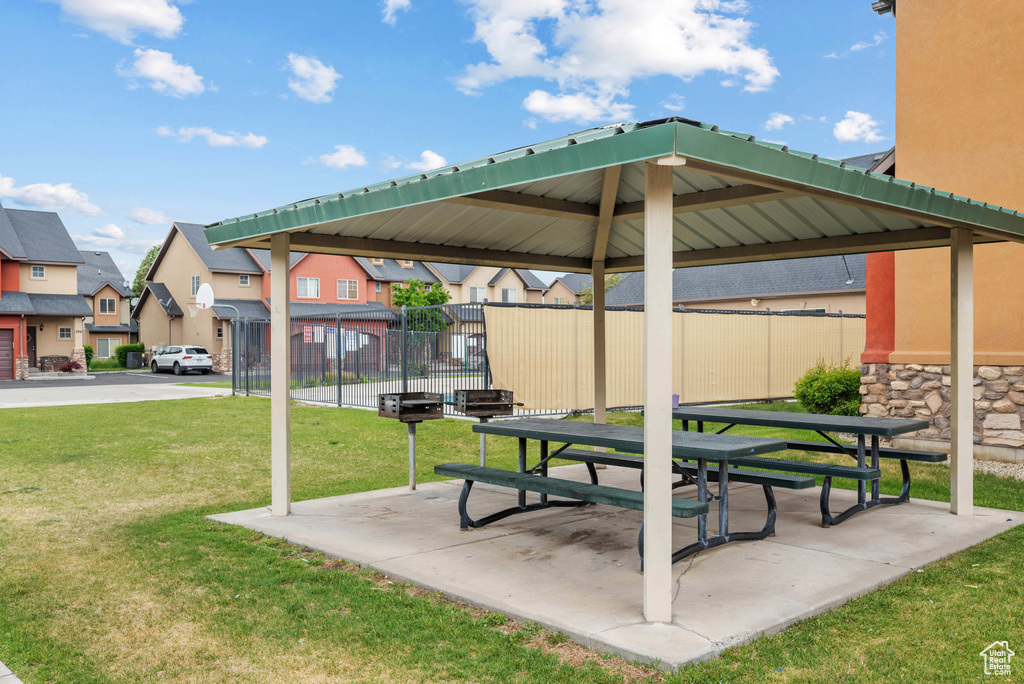 View of patio / terrace with a residential view and a gazebo