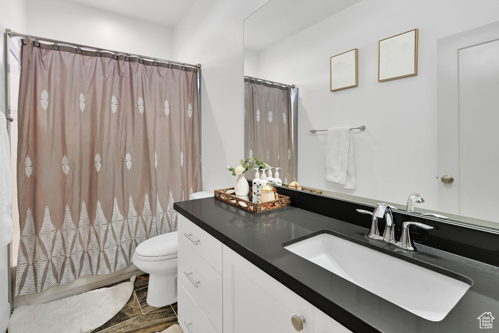 Bathroom featuring toilet and vanity