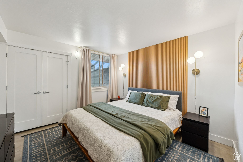 Bedroom with a closet and baseboards