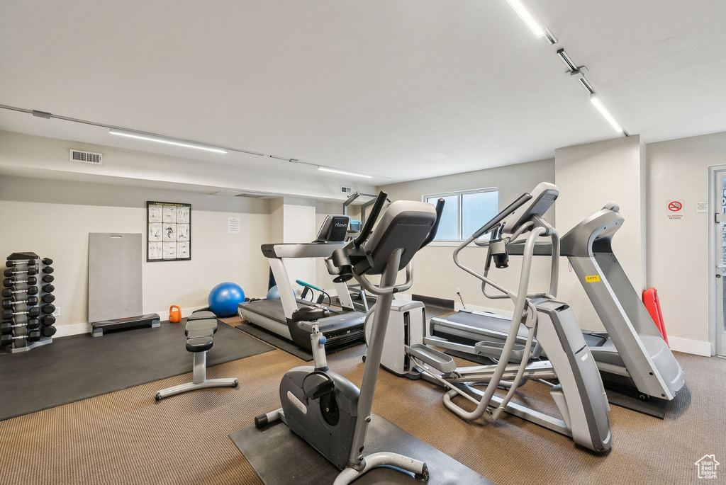 Gym featuring baseboards