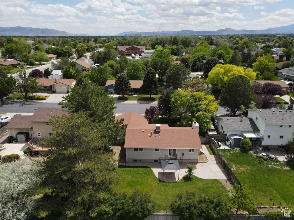 Aerial view of residential area featuring mountains
