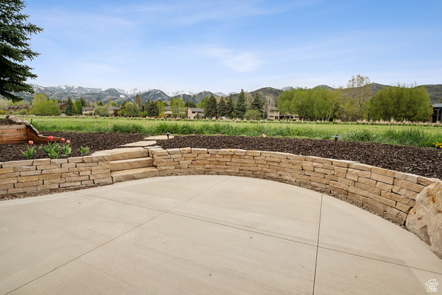 View of patio with a mountain view