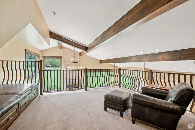 Sitting room featuring a chandelier, carpet, and recessed lighting