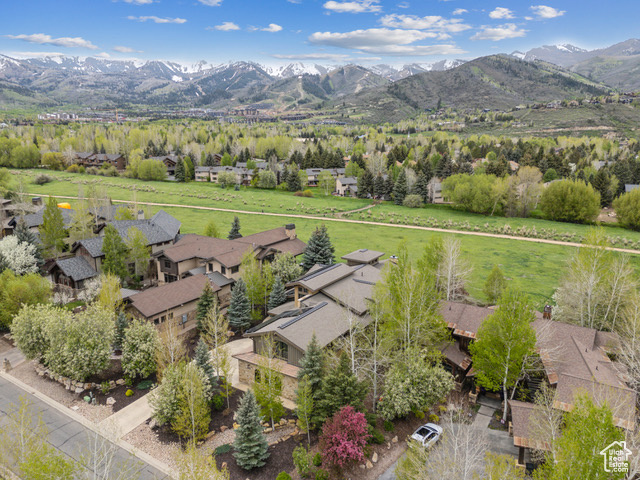 Aerial view of residential area featuring mountains