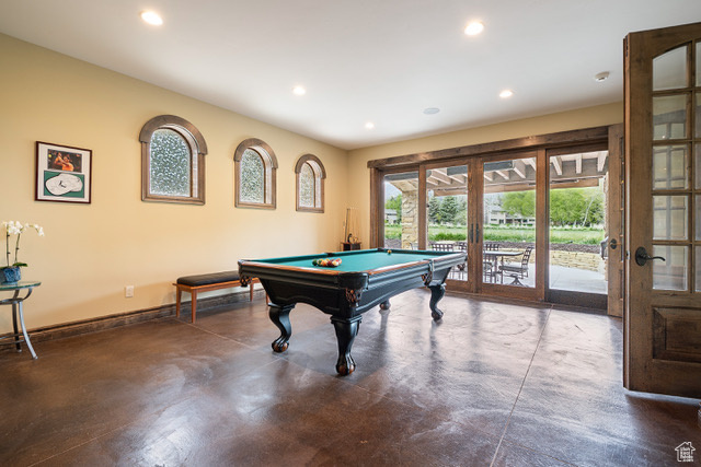 Playroom with finished concrete flooring, billiards table, recessed lighting, and baseboards