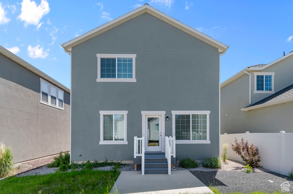 View of front facade with stucco siding