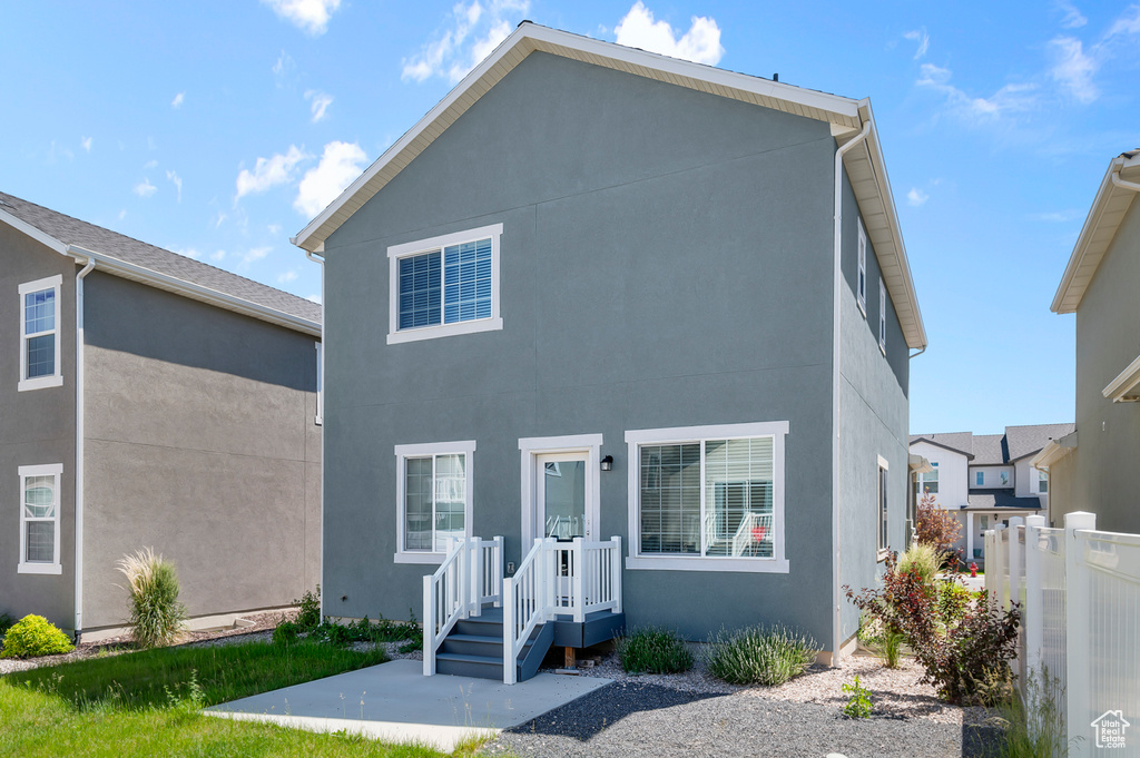 View of front of property featuring stucco siding