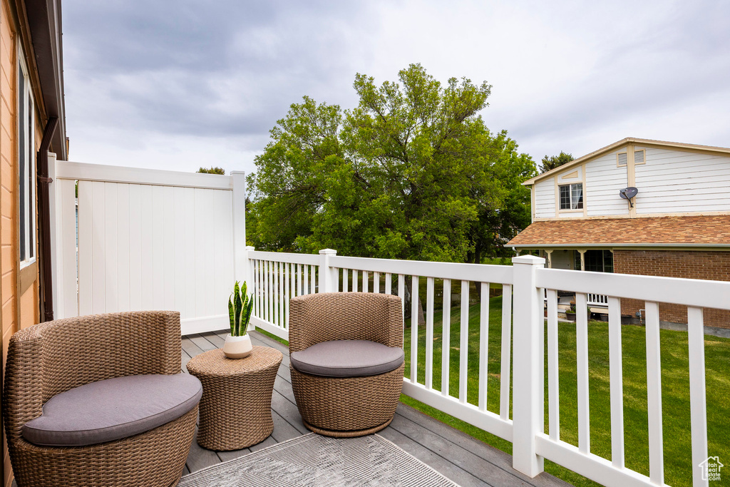 Wooden terrace with a yard