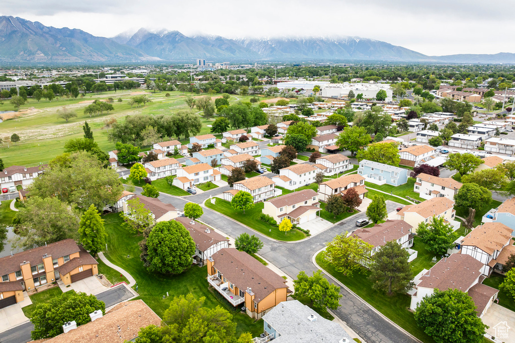 Aerial view of residential area with a mountainous background