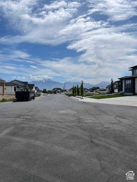 View of asphalt street with a mountain view and a residential view
