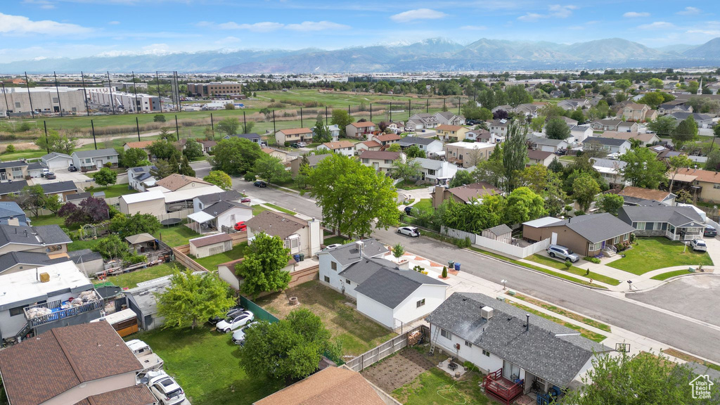 Aerial view of residential area with a mountain backdrop