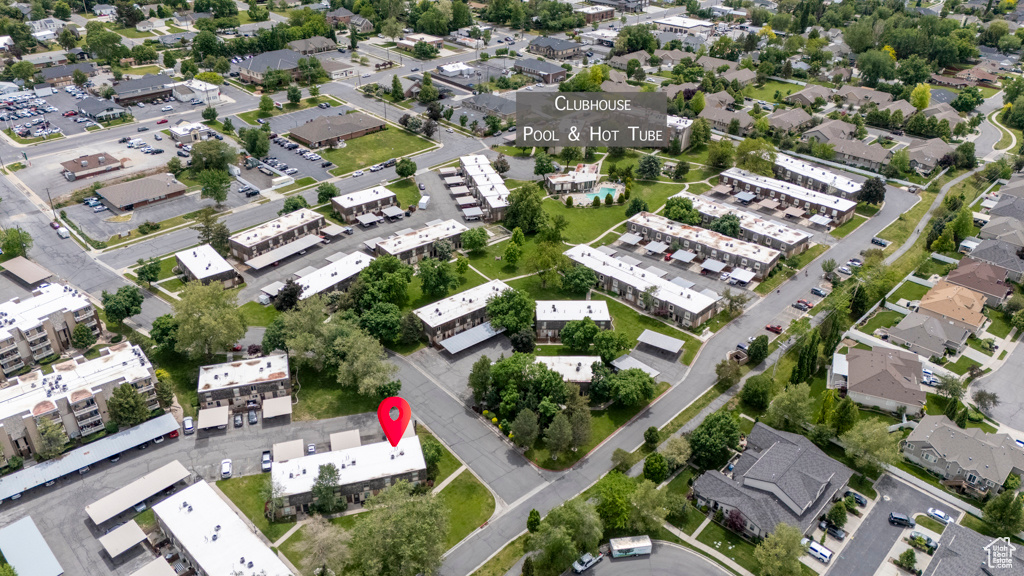 Aerial overview of property's location with nearby suburban area