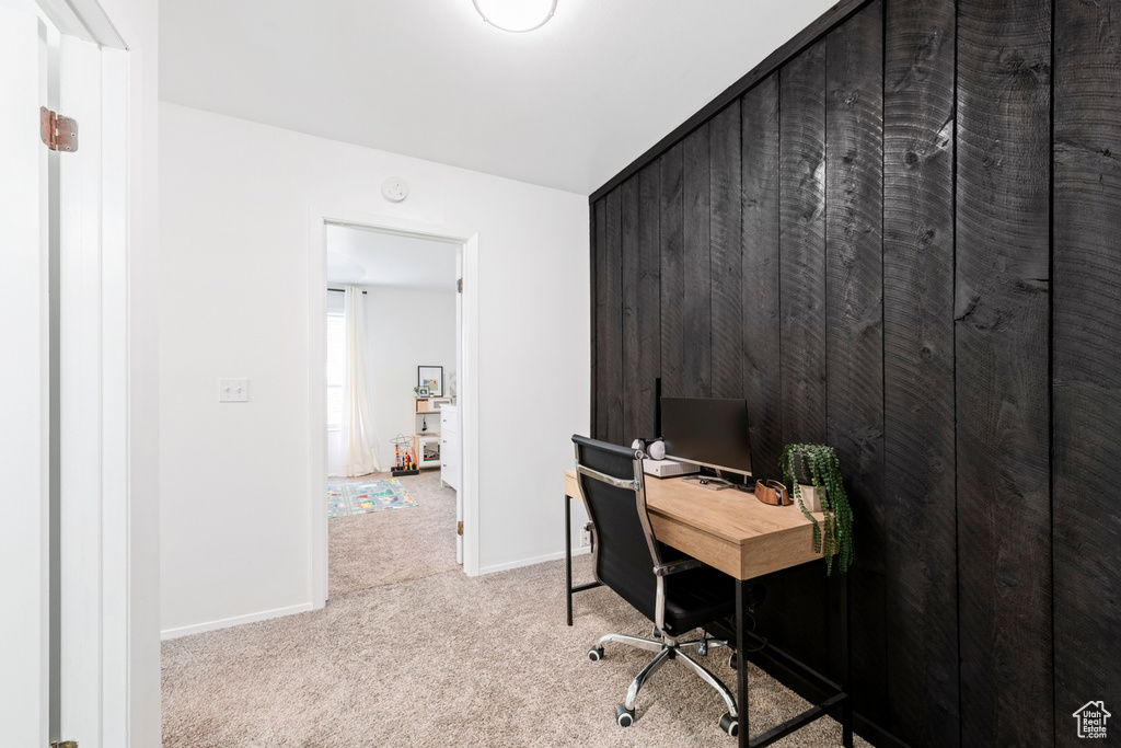 Office with carpet flooring and baseboards