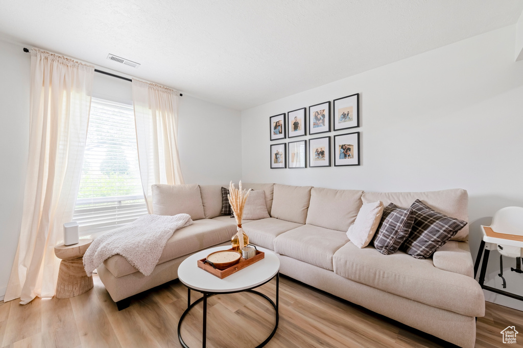 Living area with wood finished floors