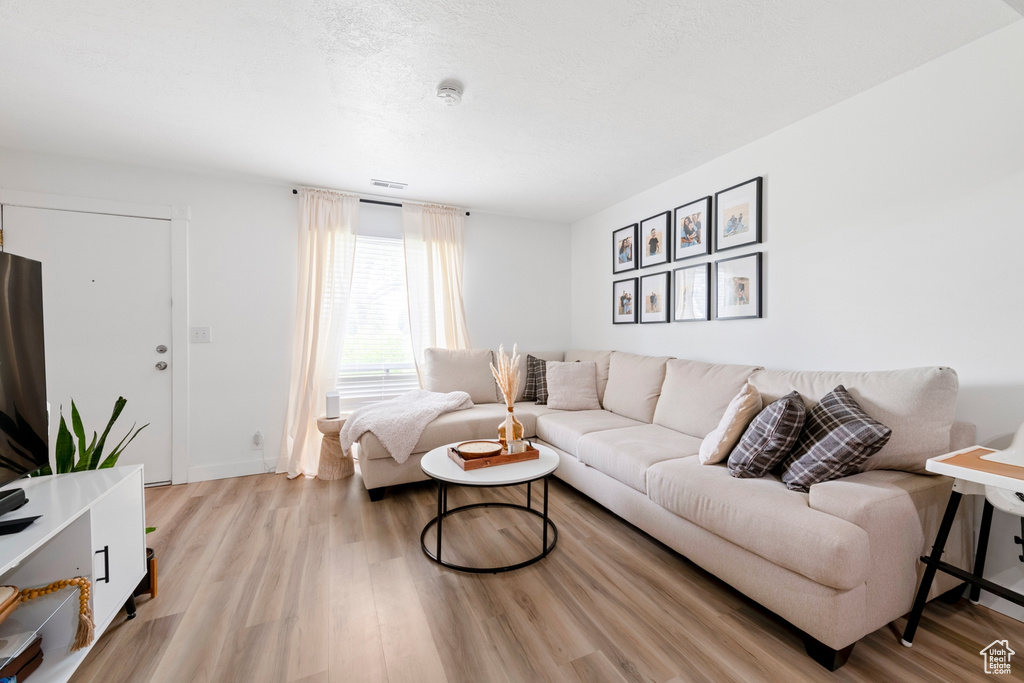Living area featuring wood finished floors