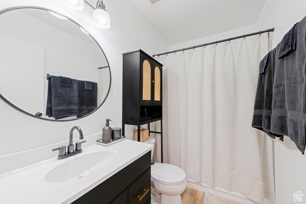 Bathroom with toilet and vanity