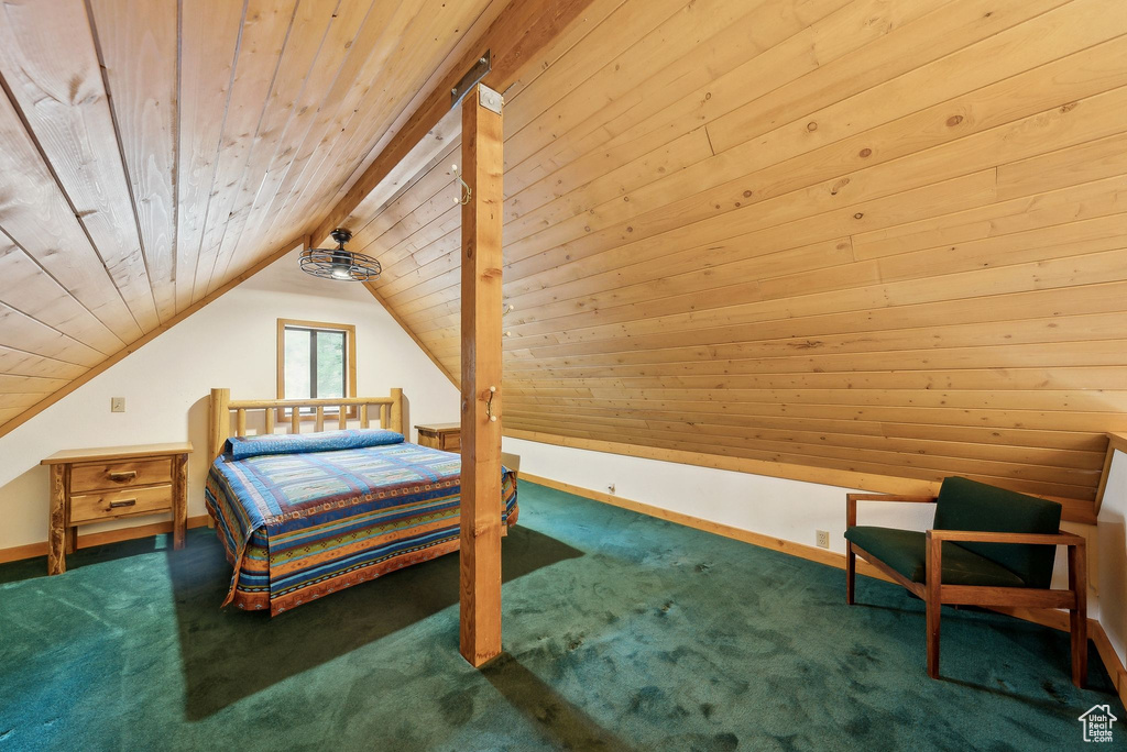 Carpeted bedroom with wood ceiling, lofted ceiling, and baseboards